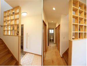 階段脇にもひと工夫。
ありがちな手すり壁も、玄関のアクセントに大変身。
小物を飾って楽しむことが出来ます。